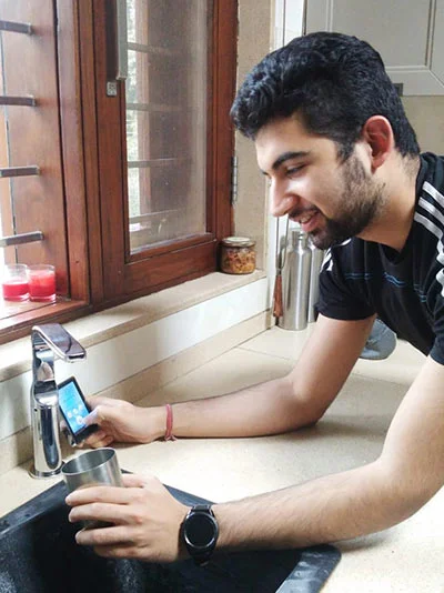 men enjoying clean, purified water from the Chanson Quality Water Purifier