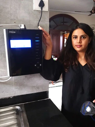 women at home with his Chanson Quality Water Purifier