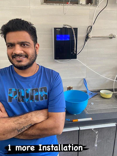 Satisfied male customer with his Chanson Quality Water Purifier