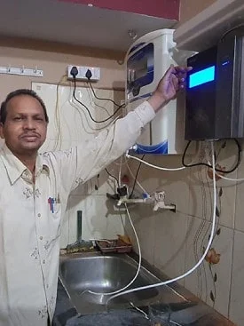 Chanson Quality Water Purifier in action with a male user