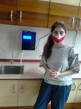 Chanson Quality Water Purifier serving a girl with clean water