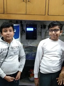 Chanson Quality Water Purifier serving a kid with clean water