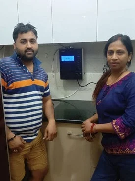 Satisfied male customer with his Chanson Quality Water Purifier