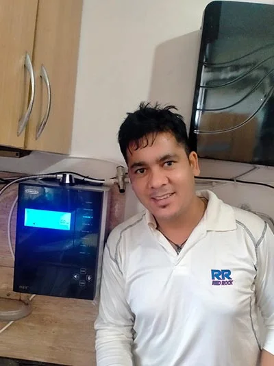 Chanson Quality Water Purifier serving a man with clean water