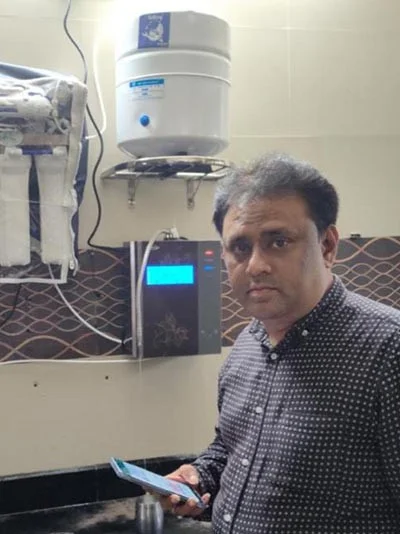 Man ensures his family's health with the Chanson Quality Water Purifier