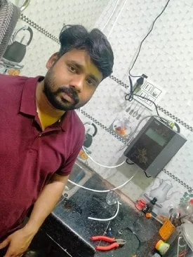 Male customer utilizing Chanson Quality Water Purifier for daily hydration