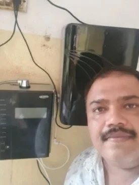 Chanson Quality Water Purifier being operated by a health-conscious man