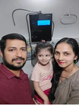 Male enjoying the ease of use of his Chanson Quality Water Purifier