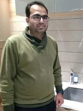 Man showcasing the convenience of using Chanson Quality Water Purifier