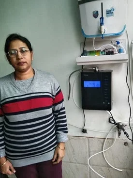 women ensures his family's health with the Chanson Quality Water Purifier