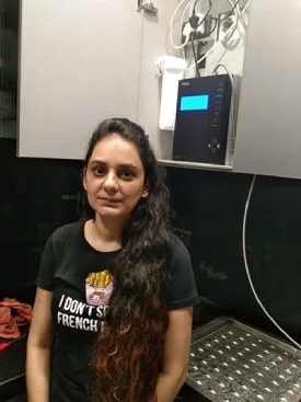 Women demonstrating the use of Chanson Quality Water Purifier
