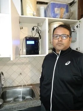 Man ensures his family's health with the Chanson Quality Water Purifier