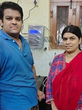 Woman standing with the reliable Chanson Quality Water Purifier