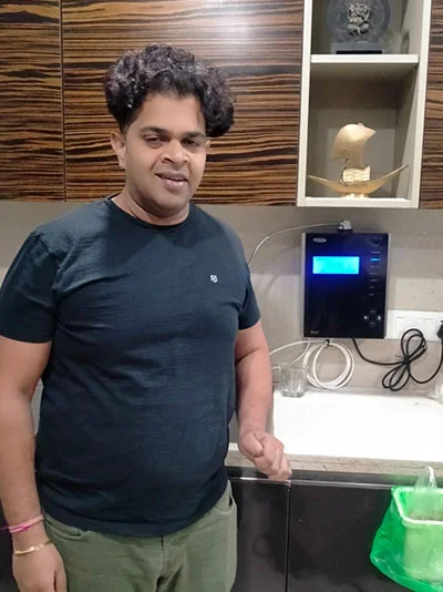 Reliable Chanson Quality Water Purifier in use by a male