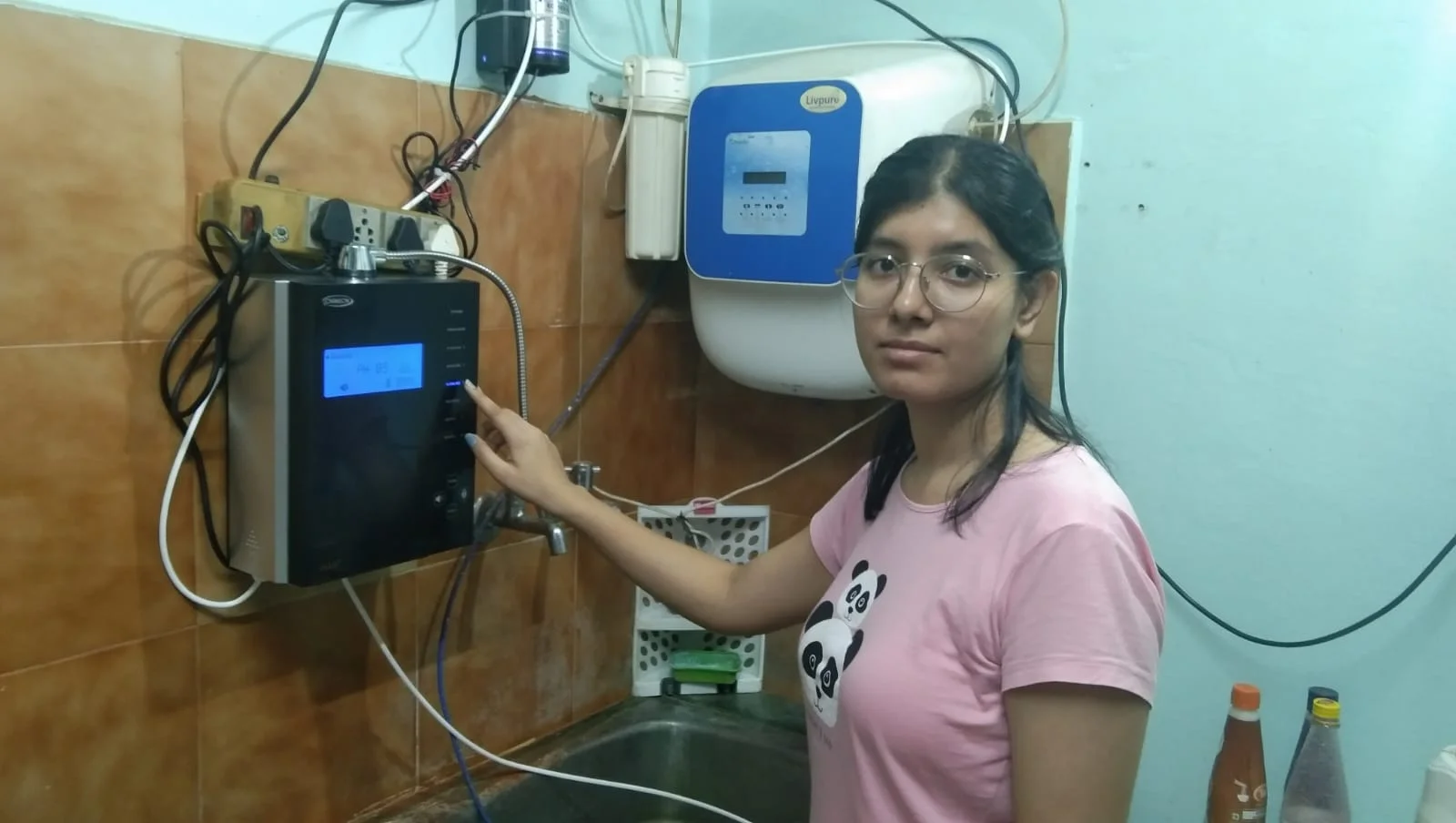 Girl taking a water break with his Chanson Quality Water Purifier