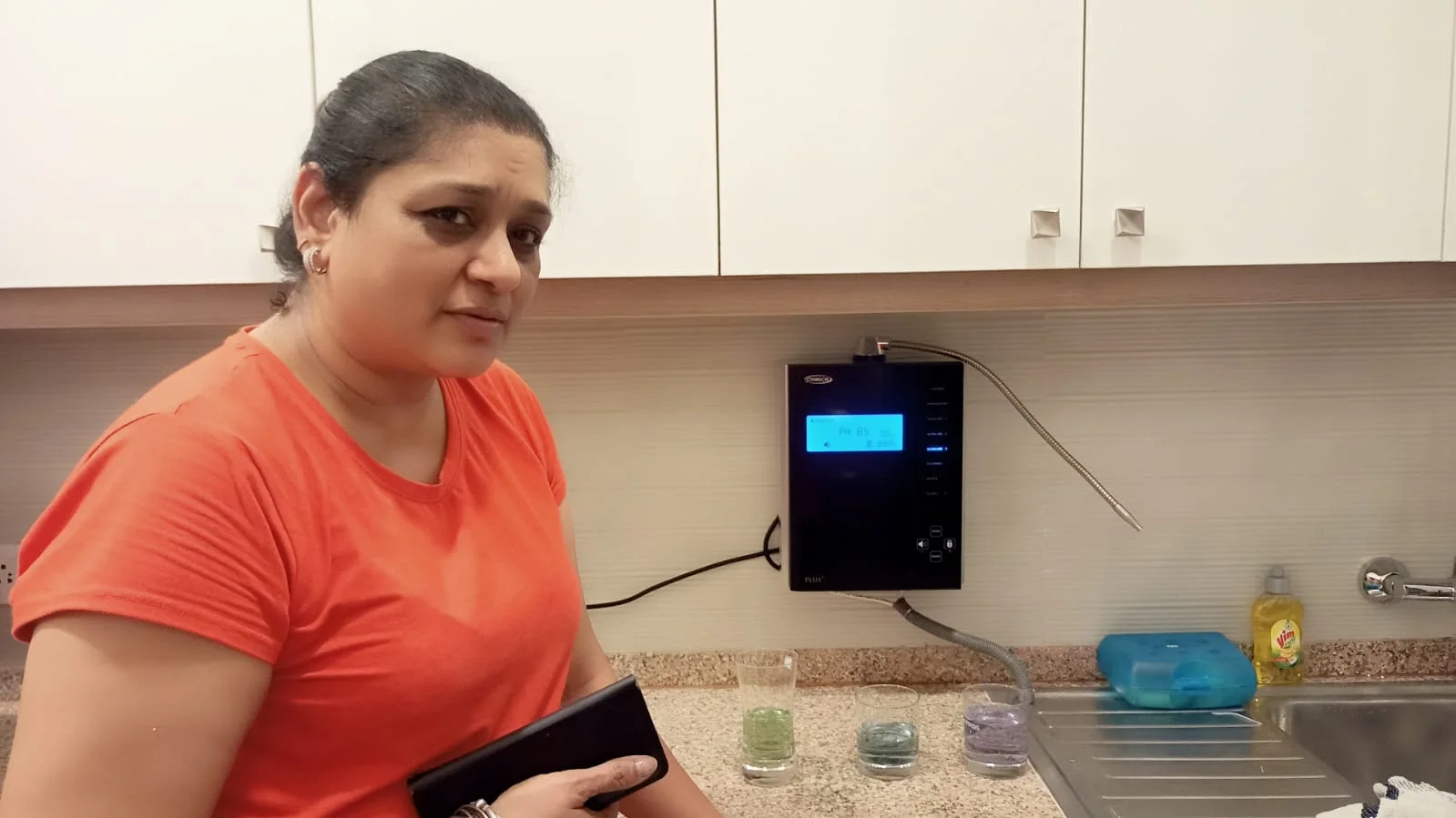 female customer cherishes his decision of Chanson Quality Water Purifier