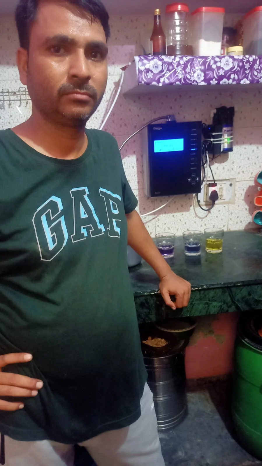 Chanson Quality Water Purifier in use by a male customer