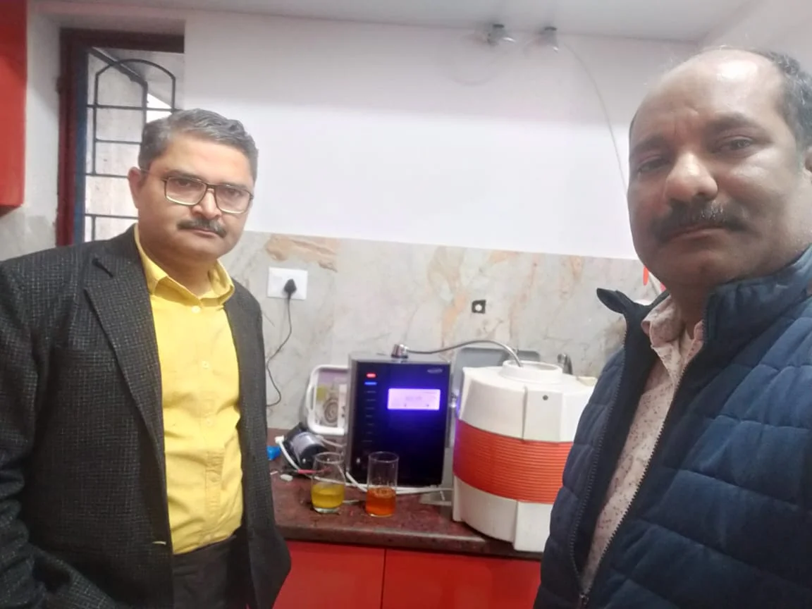 Man engaging with the user-friendly Chanson Water Purifier