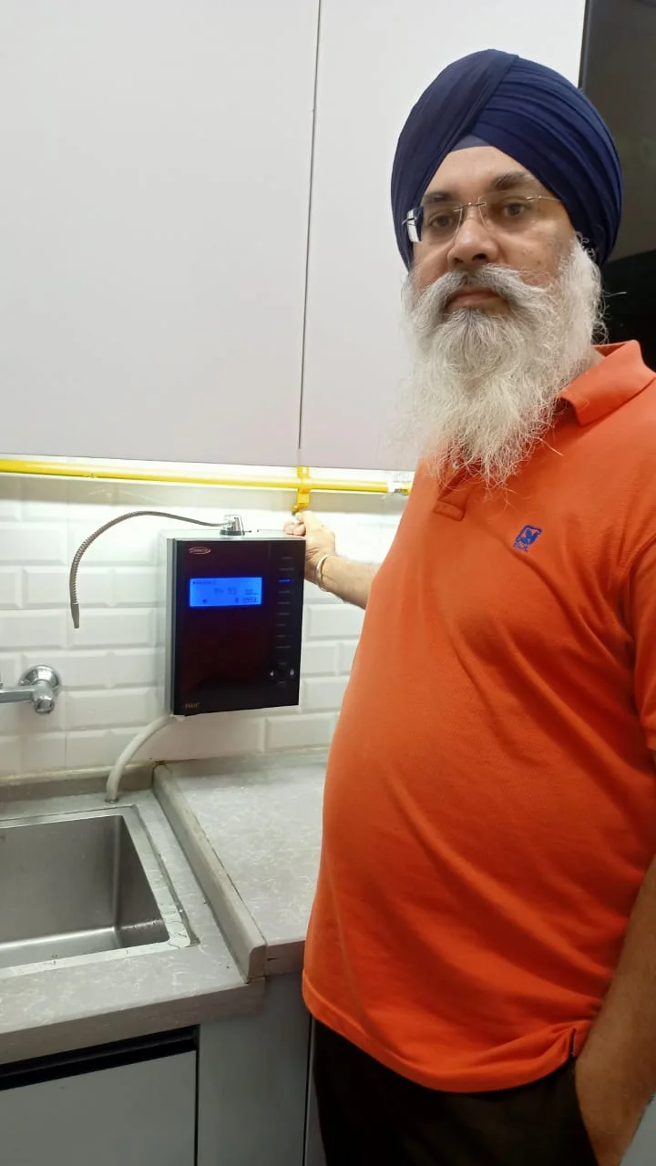 Man relies on Chanson Quality Water Purifier for pure water